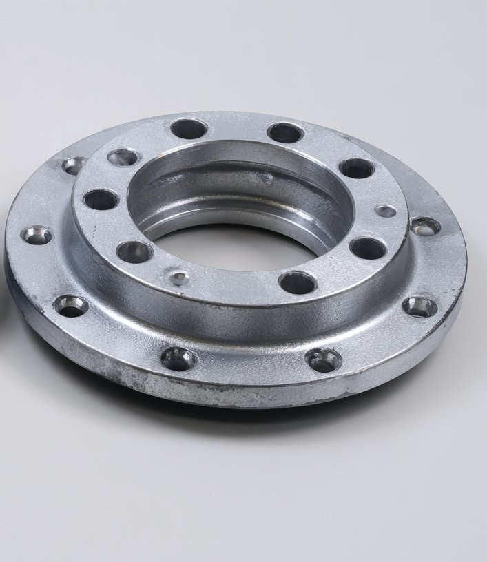 Steel flange after laser coating removal — bare machined steel